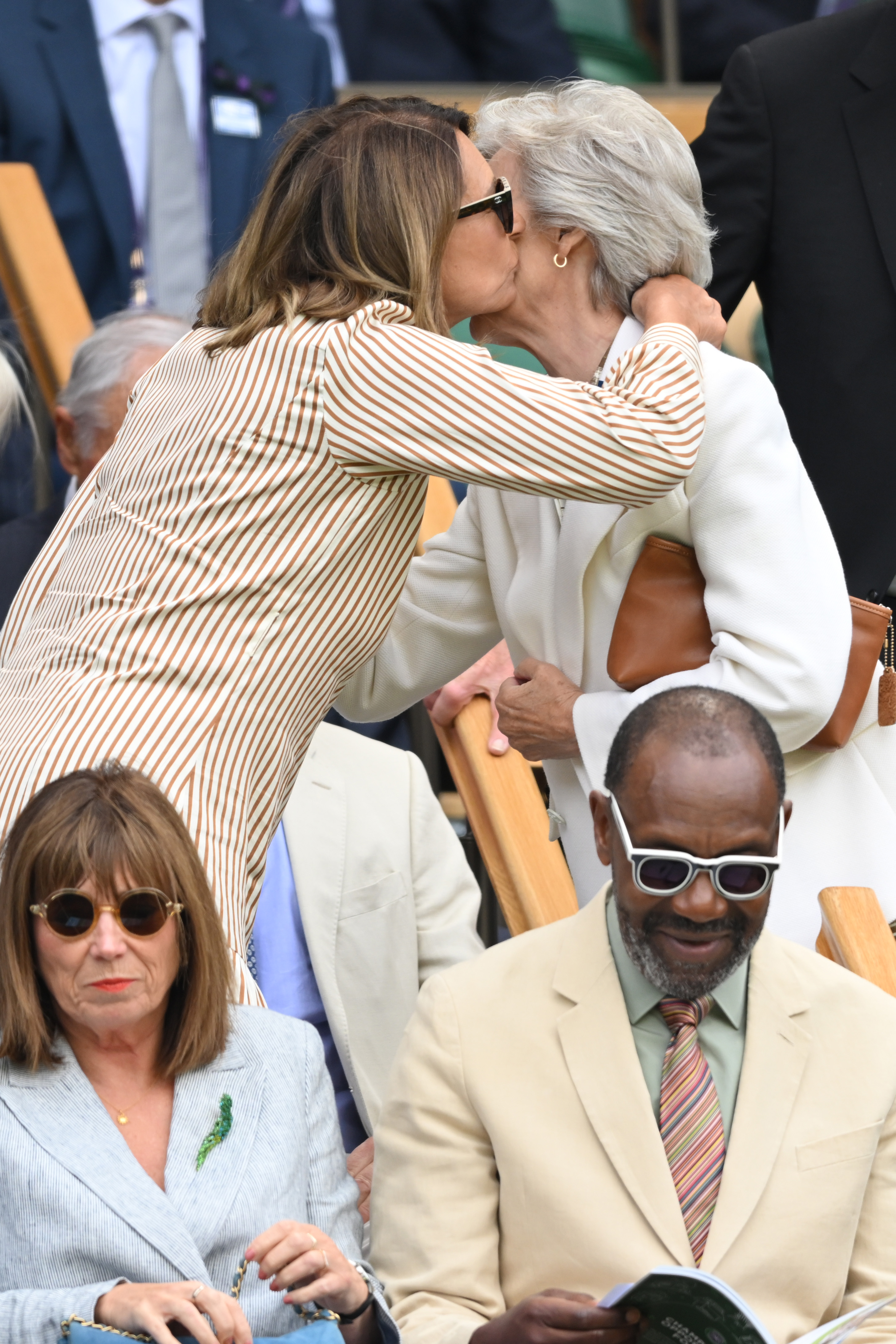 Carole Middleton kissing the Duchess of Gloucester at Wimbledon