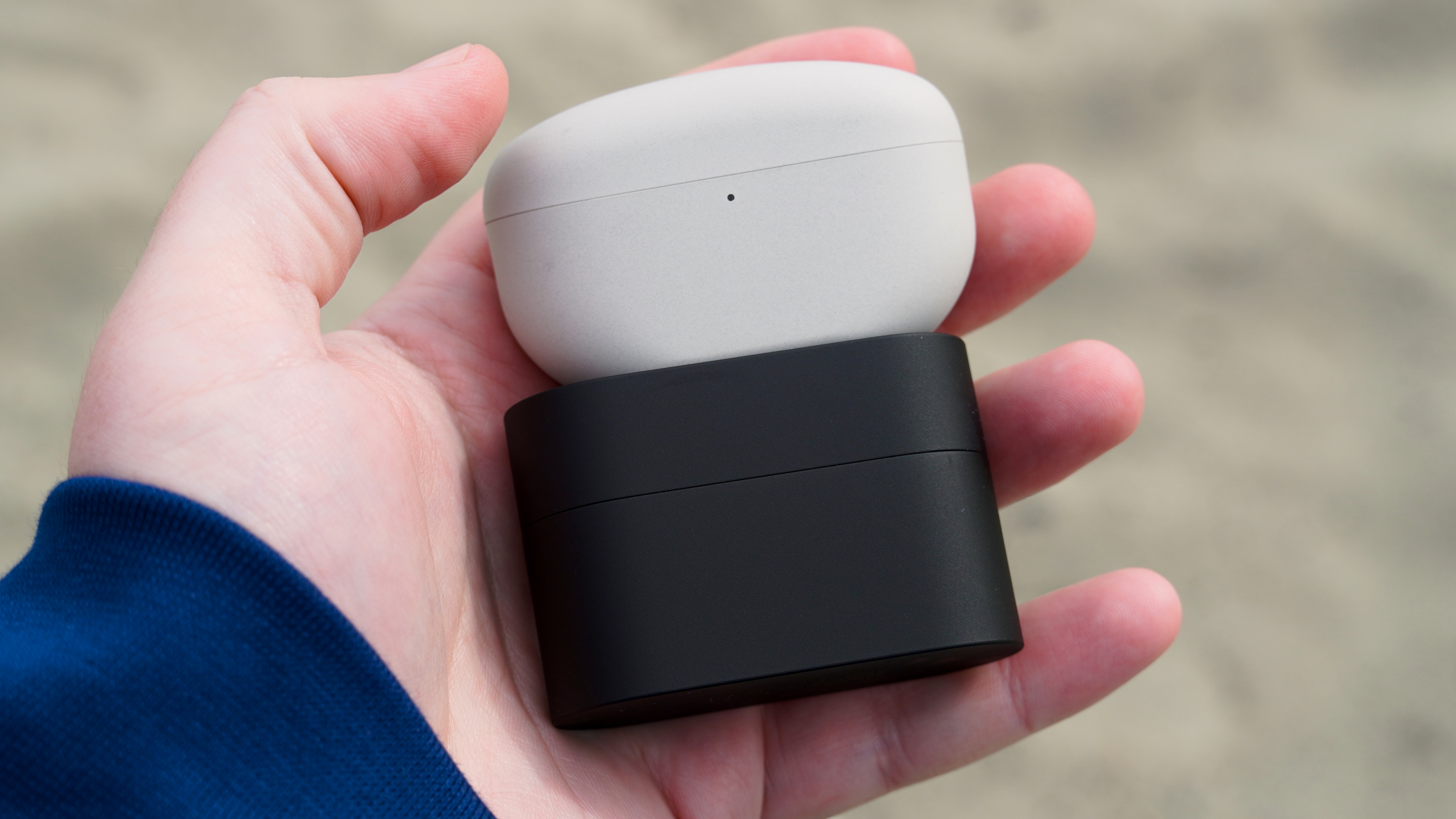 The Sony WF-1000XM5 in Platinum Silver compared to the Sony WF-1000XM6 in Black.