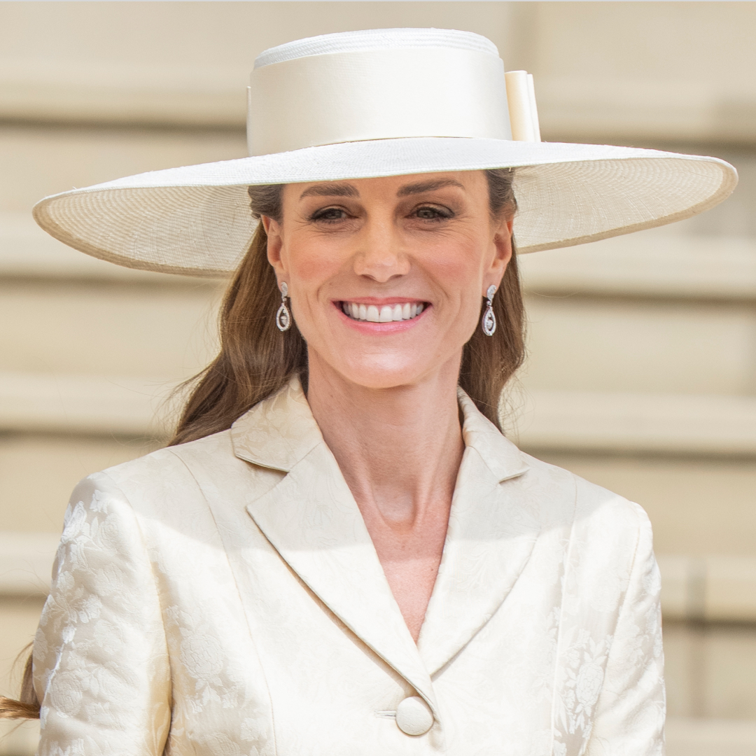 Princess Kate wearing a butter yellow coat and hat