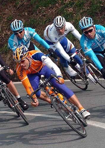 Oscar Freire corners with Tom Boonen behind