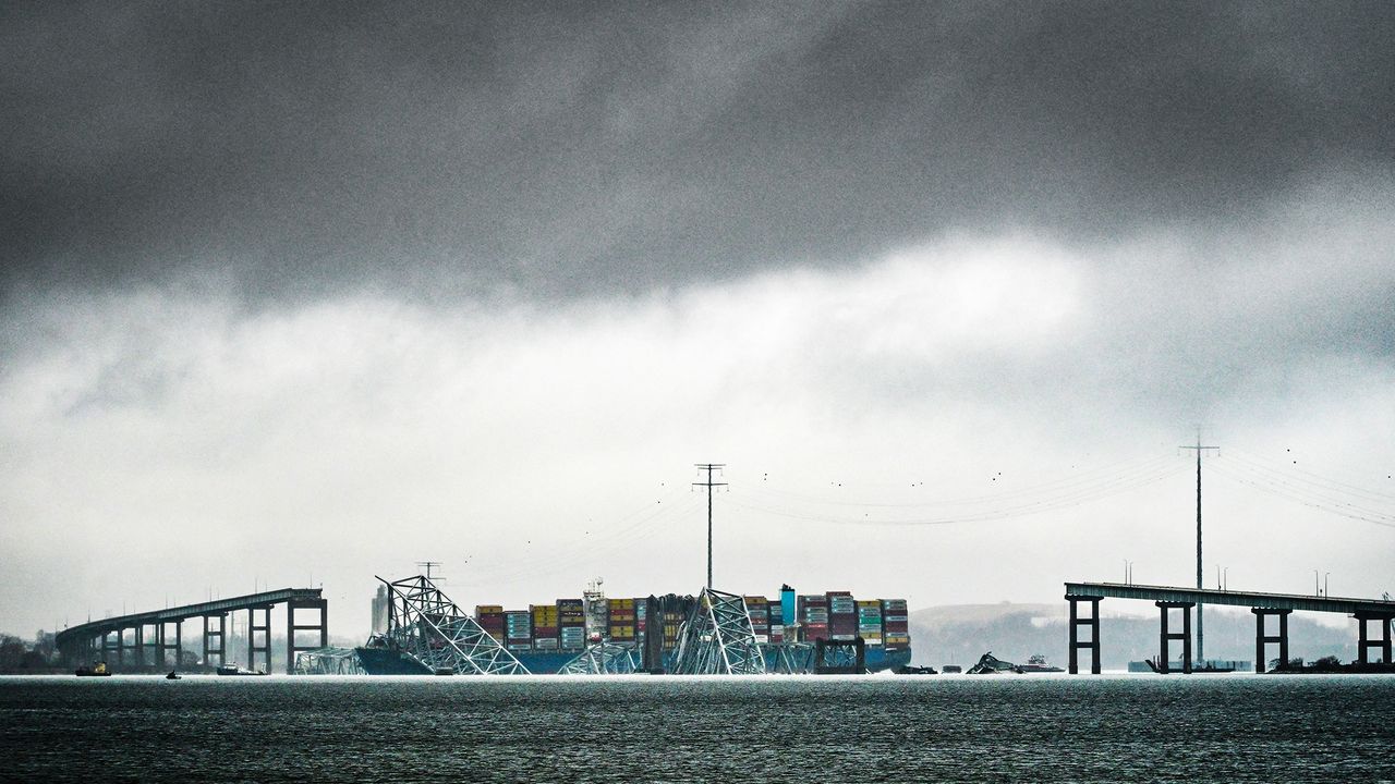 The Dali, a Singaporean-flagged cargo vessel that spans the size of almost three football fields, remains stuck under debris from the Francis Scott Key Bridge