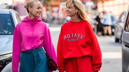 Thora Valdimars and Jeanette Friis Madsen seen wearing Rotate jogger pants, hoody and sweater outside Lovechild 1979 during Copenhagen Fashion Week Spring/Summer 2021 on August 11, 2020 in Copenhagen, Denmark. (Photo by Christian Vierig/Getty Images)