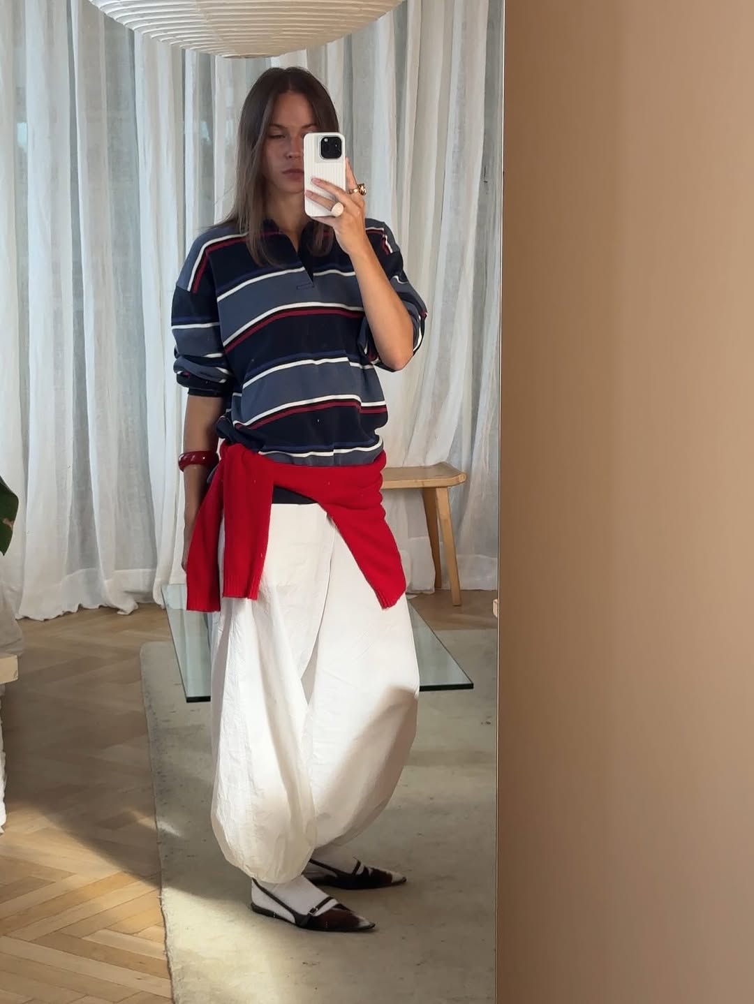 woman wearing cow print shoe outfit fall 2025
