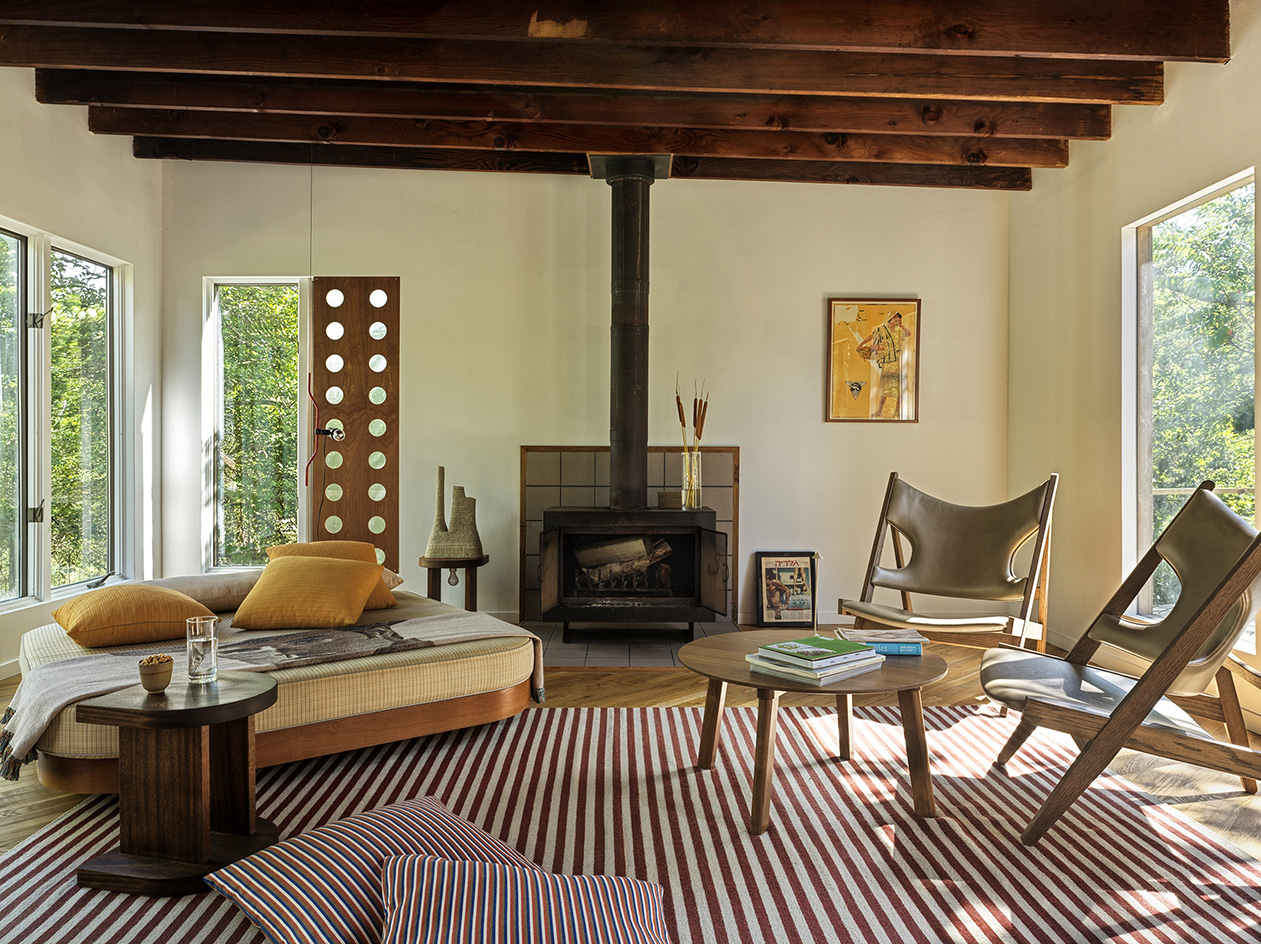 Fire Island tour of house in the pines, timber structure and pool ad warm interiors