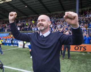 Kilmarnock manager Steve Clarke celebrates after his team secured third place