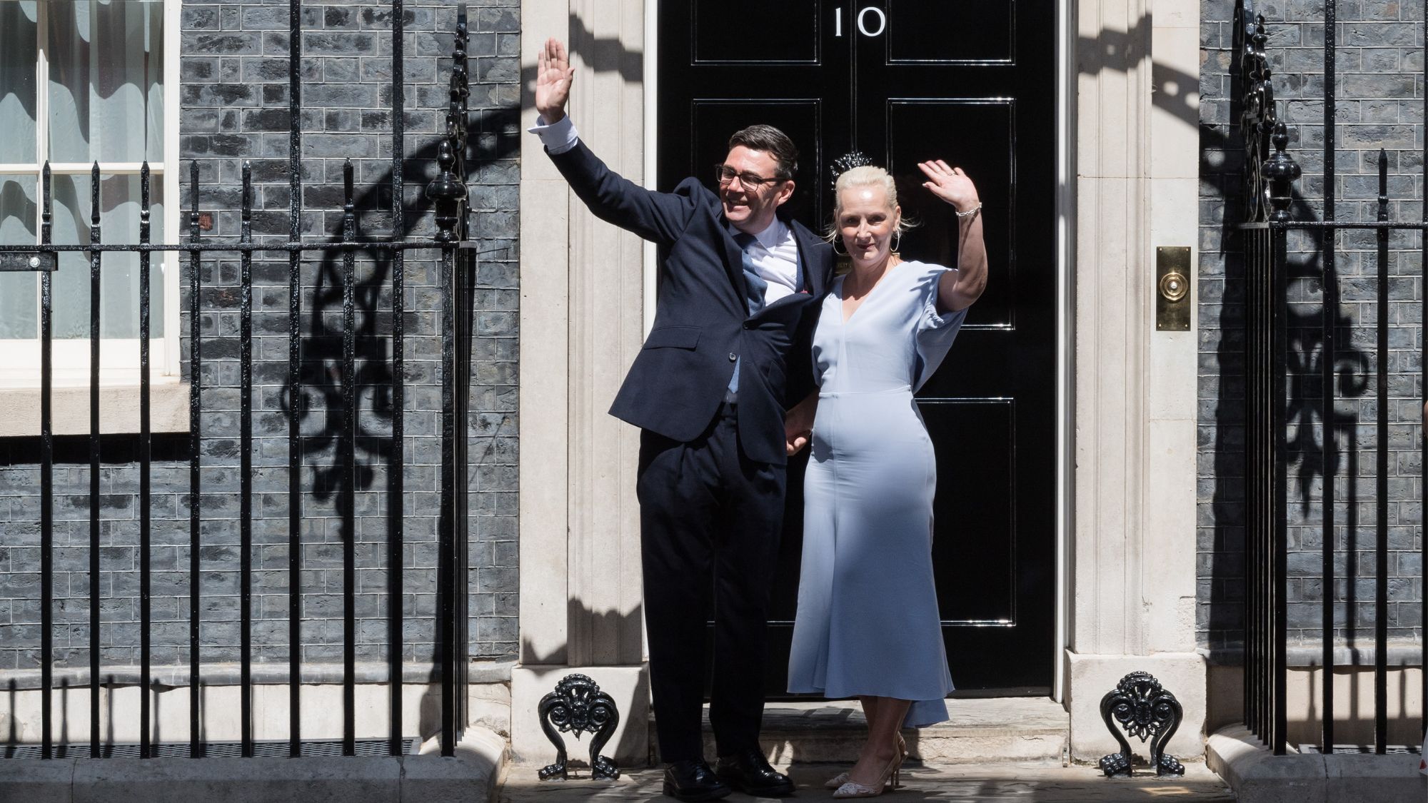 Andy Burnham and Marie-France van Heel entering 10 Downing Street