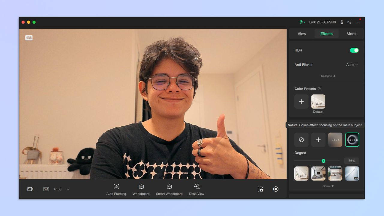 A photo of a woman with short hair, taken with the Insta360 Link 2C webcam