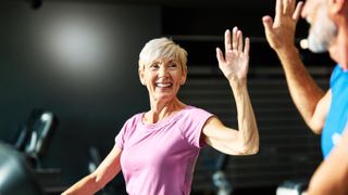 a senior woman exercising in the gym