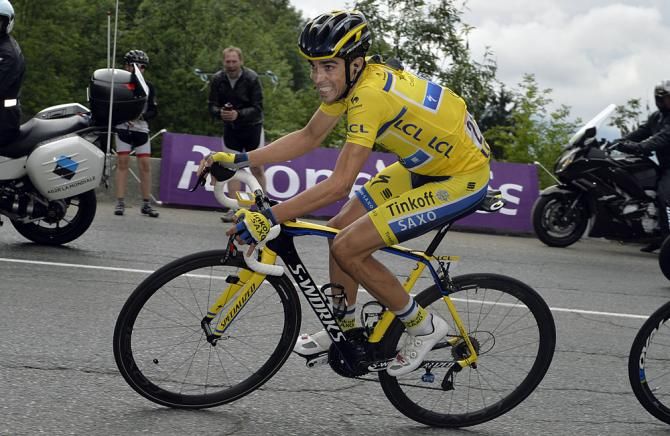 Alberto Contador (Tinkoff Saxo) tries to limit his losses to Andrew Talansky (Garmin-Sharp) before reaching the finish line