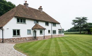 exterior of coastal cottage with arts and crafts style