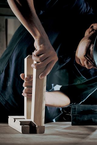 Hokkaido master craftsman working on wooden piece for Time & Style and De Padova furniture collaboration