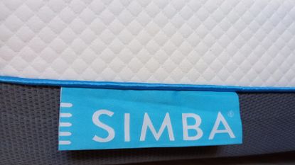 Simba mattress, with closeup on logo label