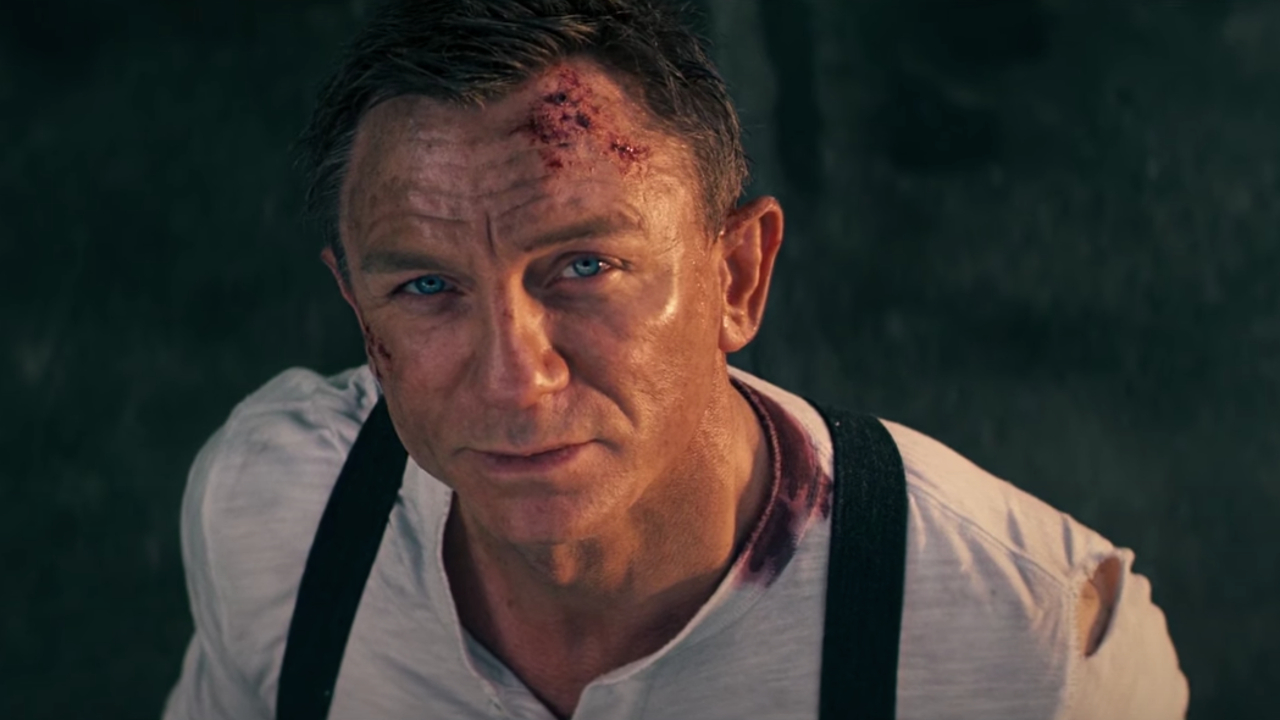 Daniel Craig looks up bittersweetly in No Time To Die.