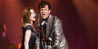 Walk Hard: The Dewey Cox Story Jenna Fischer and John C. Reilly singing at a show