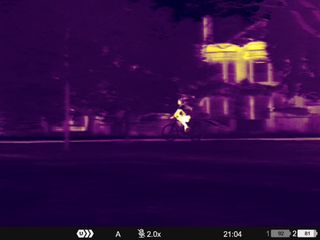 Color thermal images of people and wildlife in a park taken on a Pulsar Merger LRF XP35 binocular