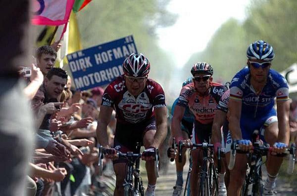 Lars Michaelsen rides next to Boonen in Arenberg