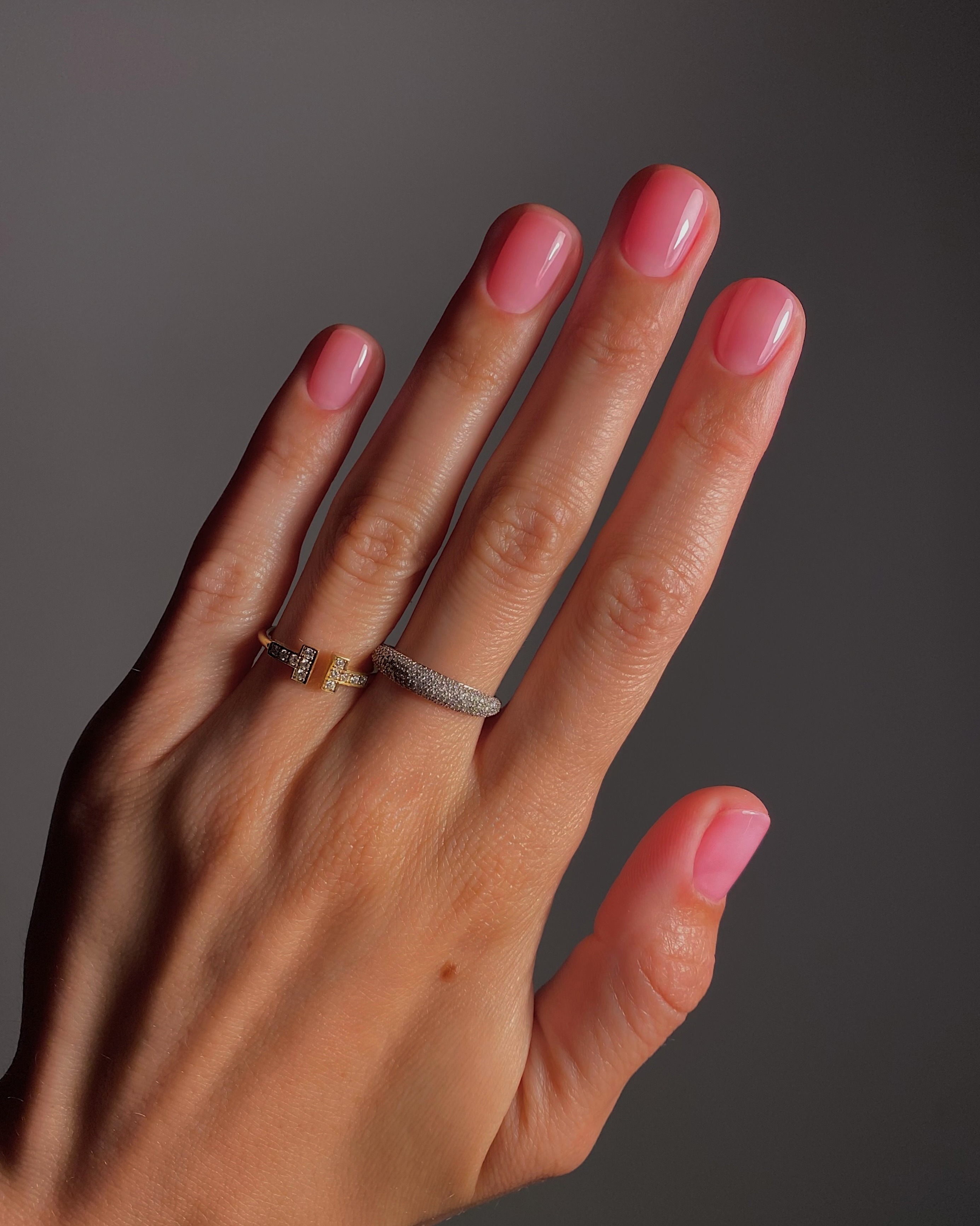 A picture of a sheer pink manicure created by @matejanova
