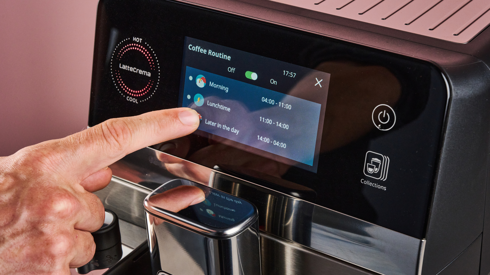 A man's hand sets different coffee routines on the De'Longhi Eletta Ultra's menu.