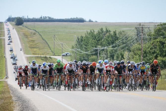 The peloton makes its way over one of today's rollers