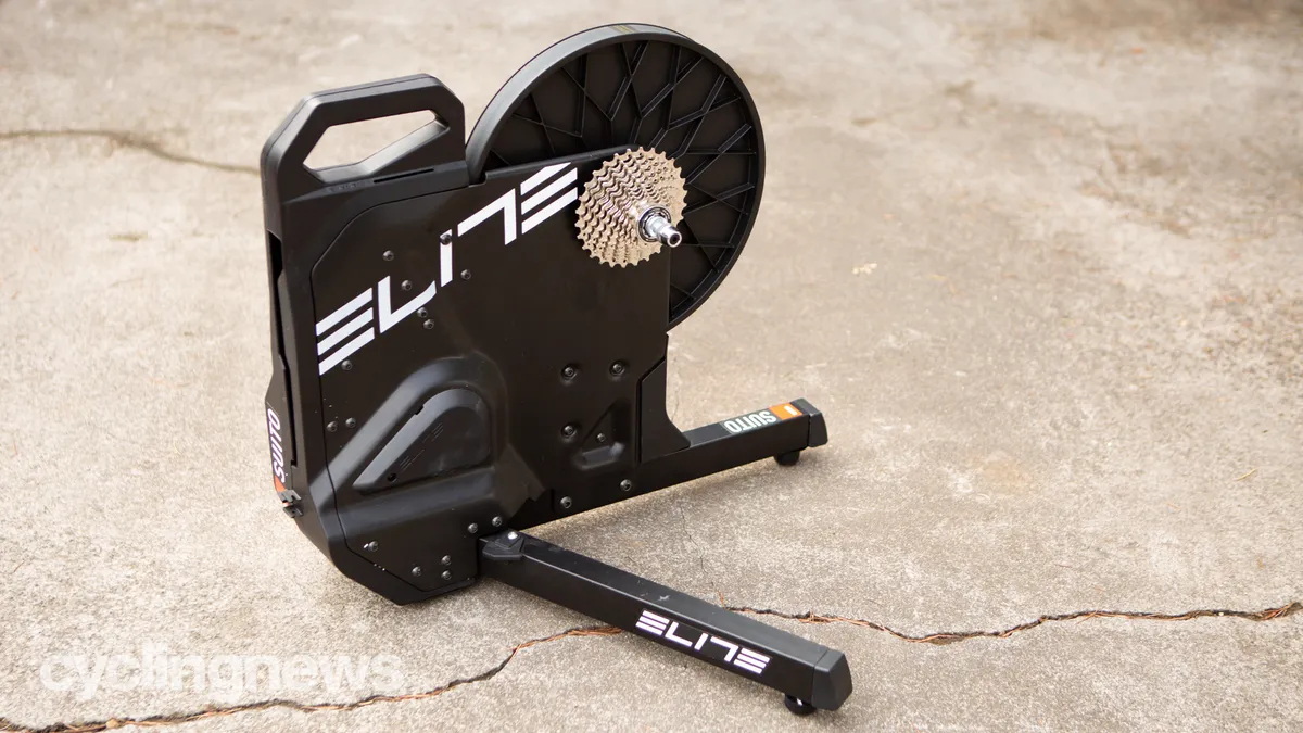Side angle of the Elite Suito Smart Trainer outdoors on the ground