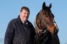 Irish trainer Shark Hanlon with &pound;800 purchase Hewick, who is now bidding for Cheltenham Gold Cup and Aintree Grand National glory.
