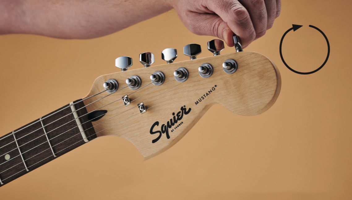 How to tune an electric guitar with a tuner Guitar World