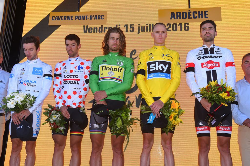 The classification leaders observe a minute of silence after the Ardeche TT