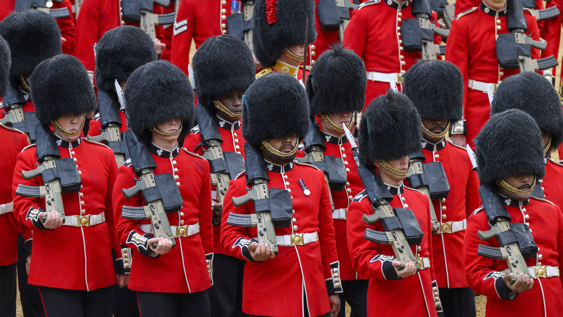 Soldiers of the Household Division and The King's Troop Royal Horse Artillery ahead of The Kings Birthday Parade