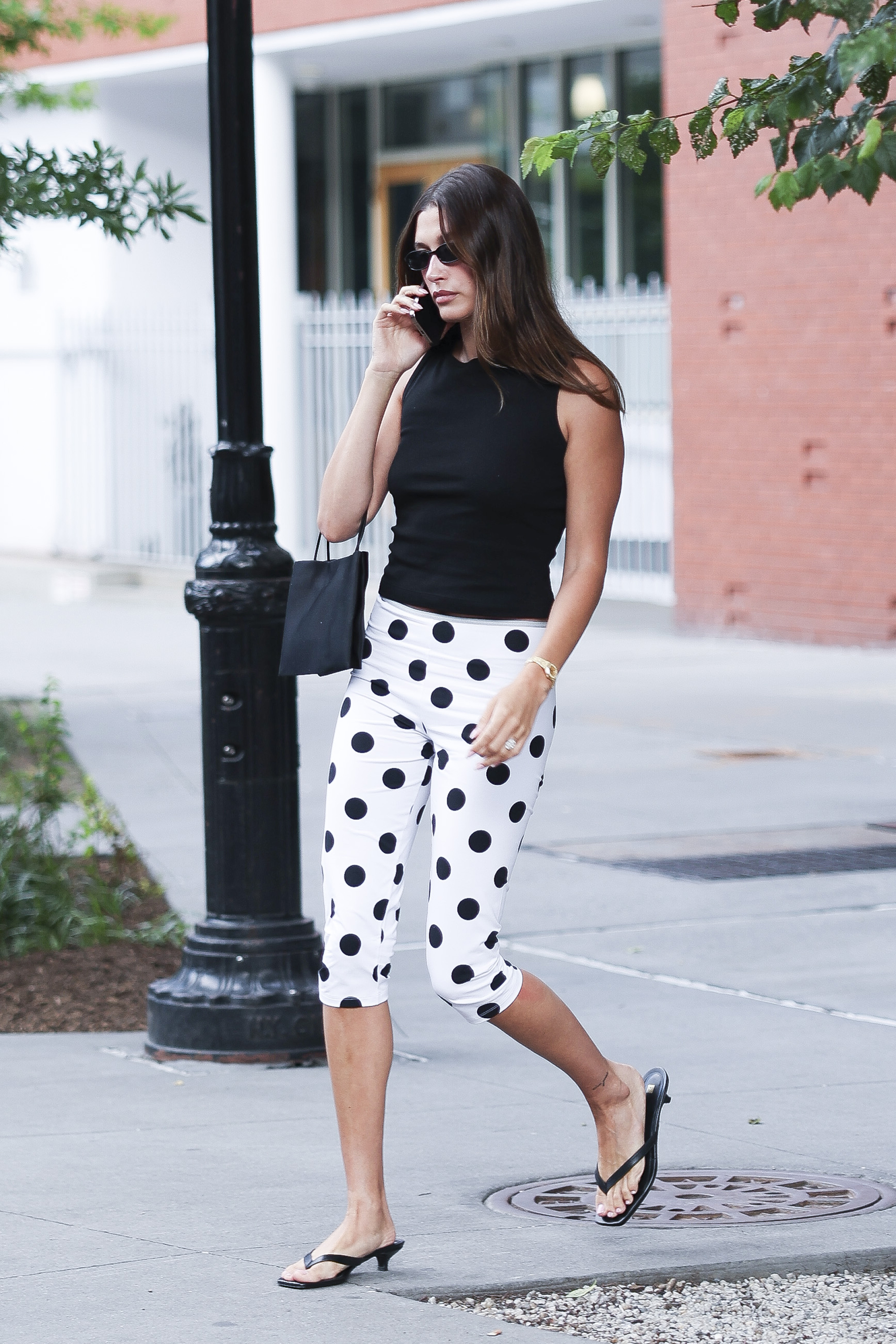 Hailey Bieber wears polka-dot leggings.