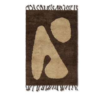 Abstract brown and beige rug.