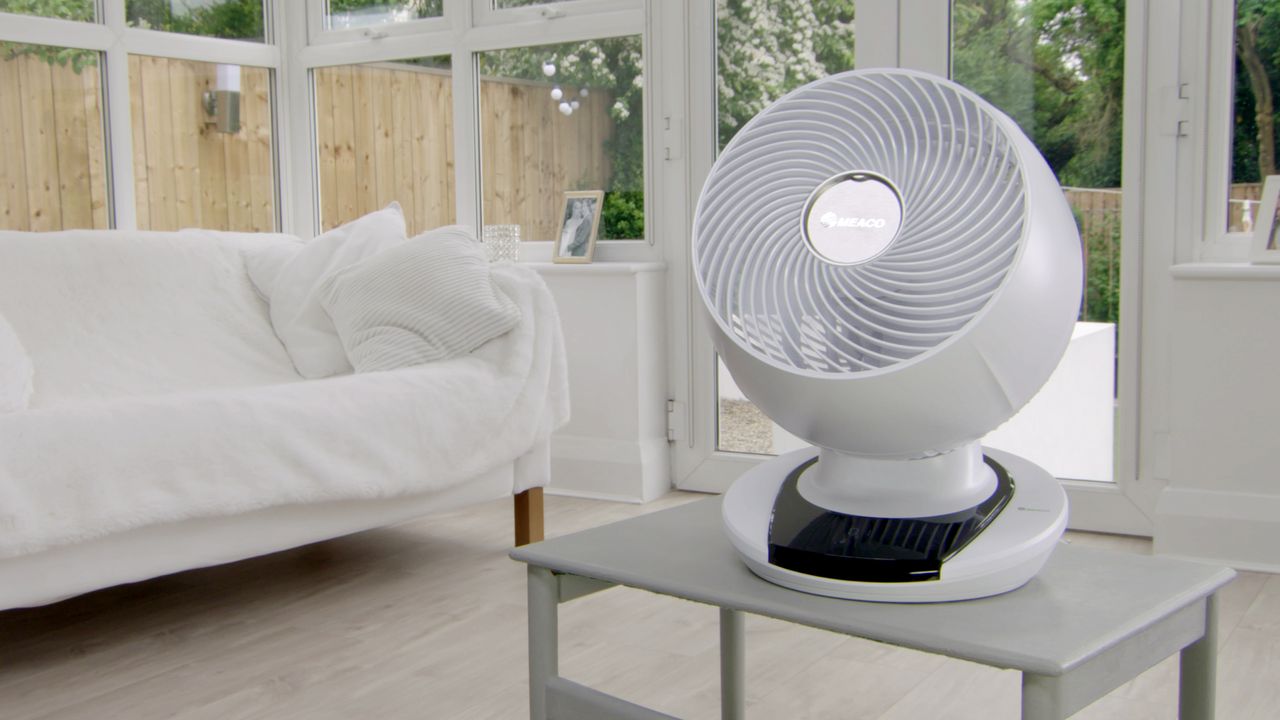 The MeacoFan 1056 Air Circulator sat on a table in a white conservatory