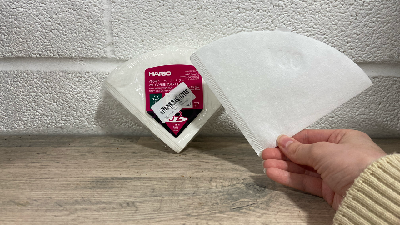 a photograph of coffee filters used for drip through coffee brewing