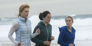 The three women of Big Little Lies running on the beach