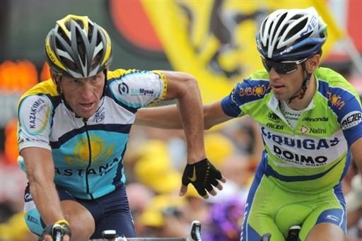 Lance Armstrong (Astana) congratulates Vincenzo Nibali (Liquigas) after crossing the finish line.