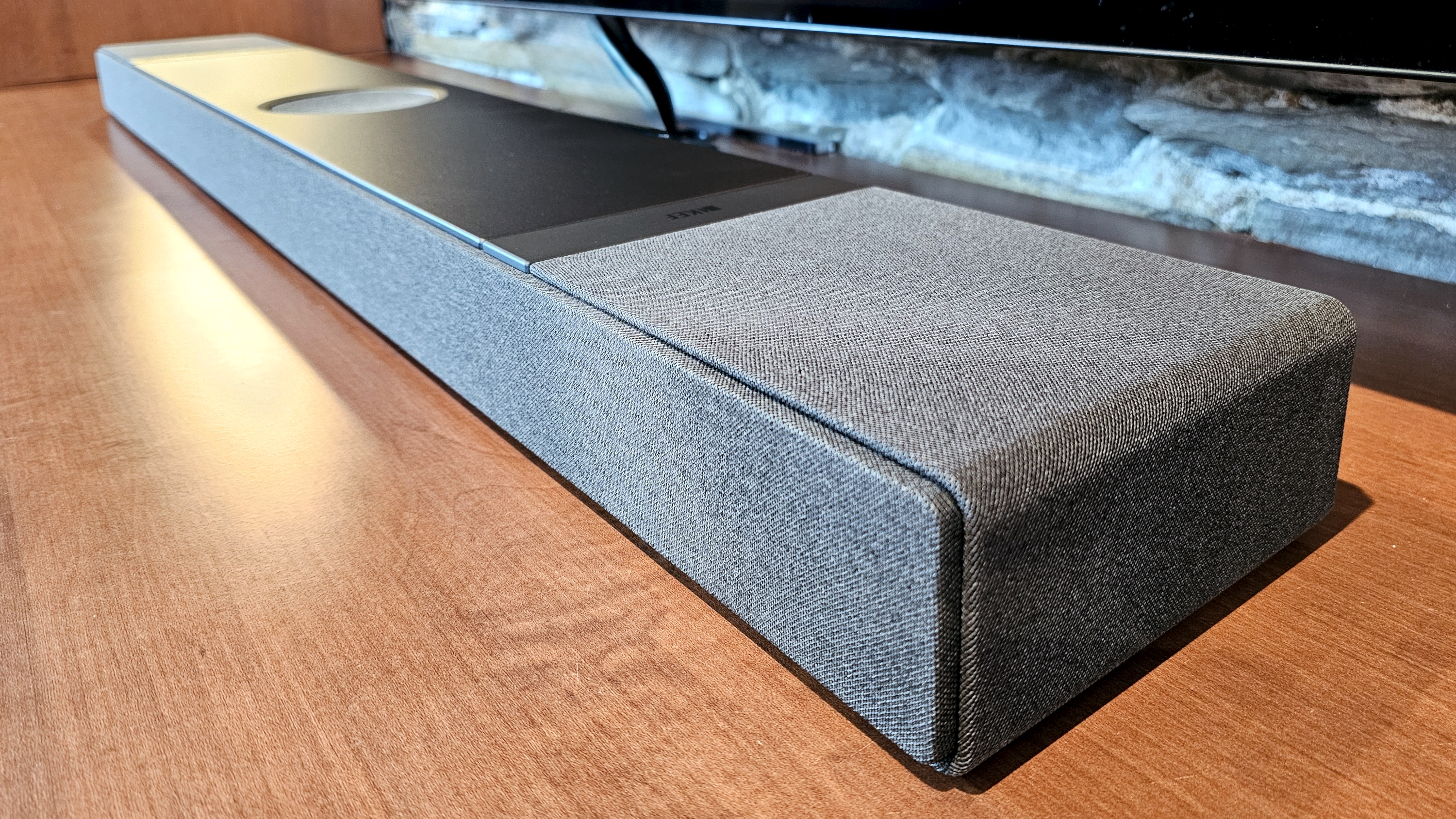 KEF XIO on table. Close up shots showing design features