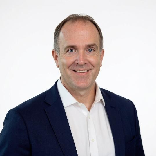 Smiling headshot of Tyler Affolter.