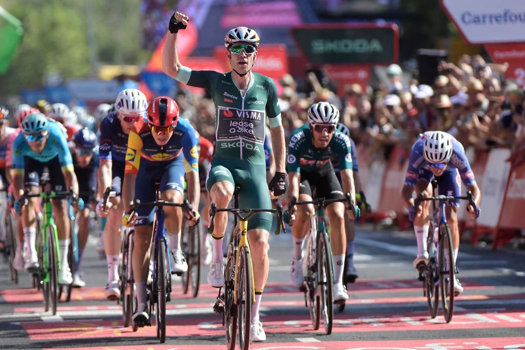 Team Visma&#039;s Wout van Aert celebrates winning the stage 7 of La Vuelta a Espana cycling tour, a 180.5 km race between Archidona and Cordoba, on August 23, 2024. (Photo by CRISTINA QUICLER / AFP)