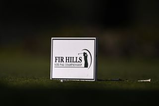 A close up of the FIR HILLS SERI PAK Championship tee marker