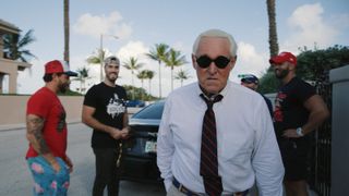 Veteran right-wing political operator Roger Stone [centre] is the focus of "A Storm Foretold"