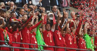 When is the FA Cup final 2023? Jordan Henderson of Liverpool lifts The FA Cup trophy after their sides victory during The FA Cup Final match between Chelsea and Liverpool at Wembley Stadium on May 14, 2022 in London, England.