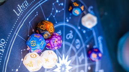 Libra season 2022: Horoscope zodiac circle with divination dice. Fortune telling and astrology predictions concept, magic rituals and exoteric experience.