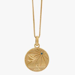 personalised gifts gold pendant necklace with a bird sky and pyramid etched into it