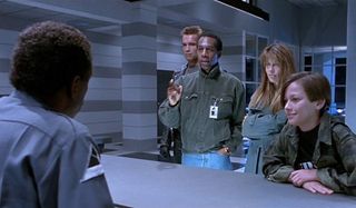 Terminator 2: Judgement Day Miles Dyson, The Connors, and their T-800 at Cyberdyne's main desk