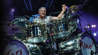 ELP's Carl Palmer behind a drum kit live on stage at HRH Prog 6