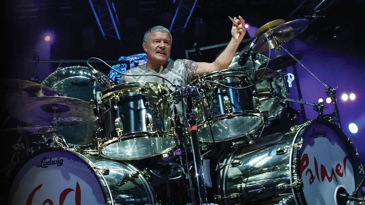 ELP&#039;s Carl Palmer behind a drum kit live on stage at HRH Prog 6