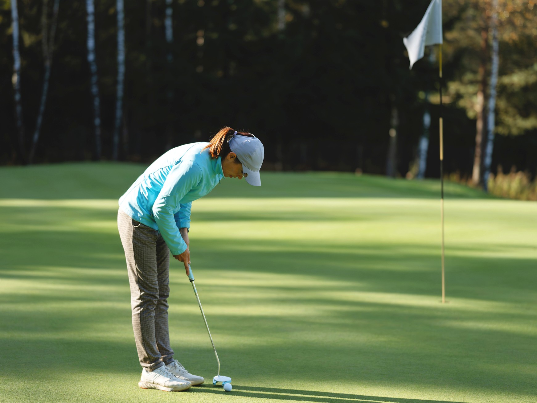 Stock image of a woman putting
