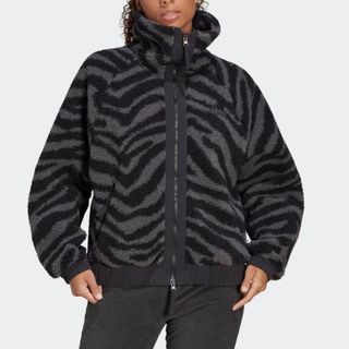 model wearing Adidas Zebra Fleece Jacket
