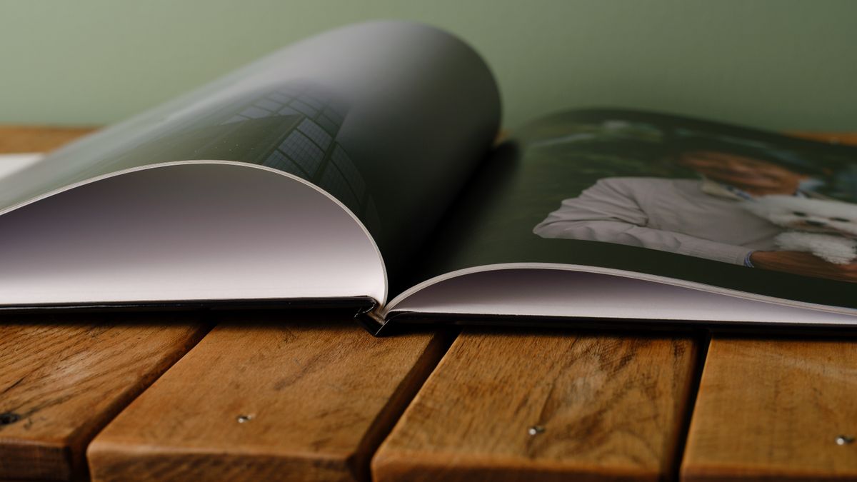 The Whitewall coffee table photo book on a desktop