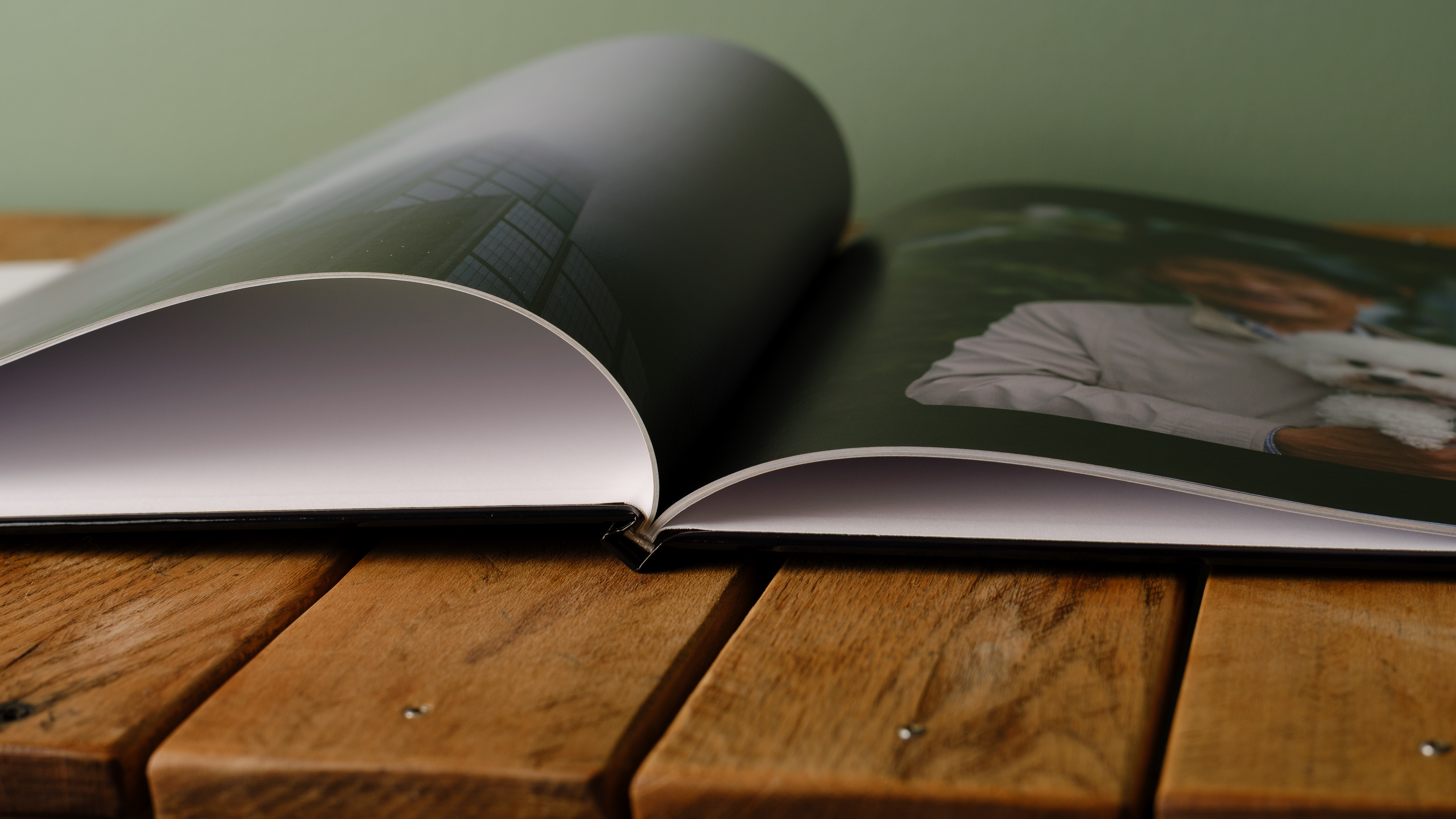 The Whitewall coffee table photo book on a desktop