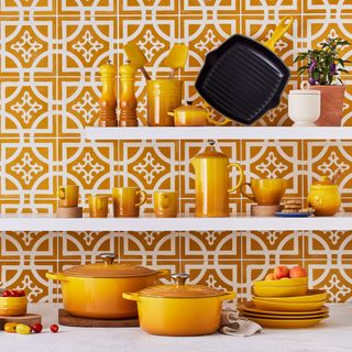 Yellow cast iron cookware and stoneware